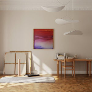 Sakura – limited edition abstract art print by INKIS, shown framed in an art studio interior with vibrant red, pink, and purple tones, sold unframed by Tonomi