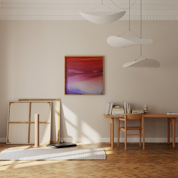 Sakura – limited edition abstract art print by INKIS, shown framed in an art studio interior with vibrant red, pink, and purple tones, sold unframed by Tonomi