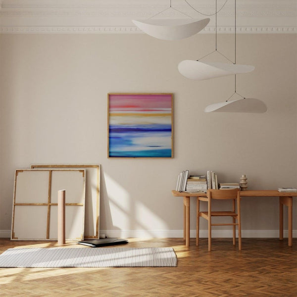 Santorini - limited edition abstract art print by INKIS, shown framed in an art studio for context, available unframed from Tonomi