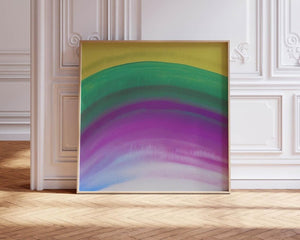 Spectrum – limited edition abstract art print by INKIS, shown framed with layered arcs of green, purple, and soft blue in a classic interior, sold unframed by Tonomi