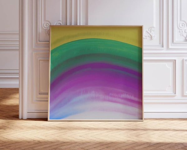 Spectrum – limited edition abstract art print by INKIS, shown framed with layered arcs of green, purple, and soft blue in a classic interior, sold unframed by Tonomi