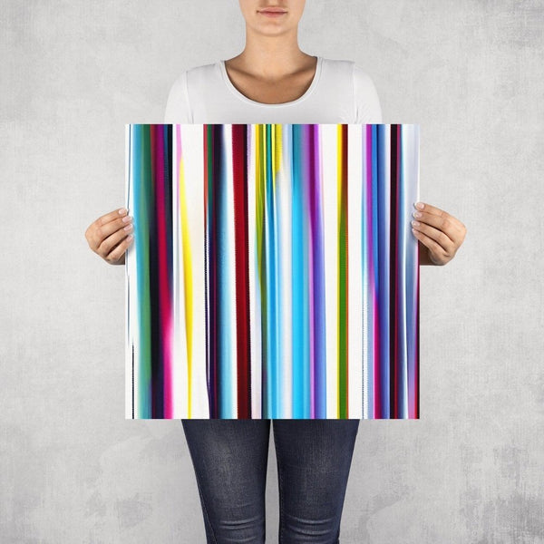 Stripped – limited edition abstract art print by INKIS, shown unframed and held for scale in 50 × 50 cm size, featuring vibrant vertical stripes, available at Tonomi
